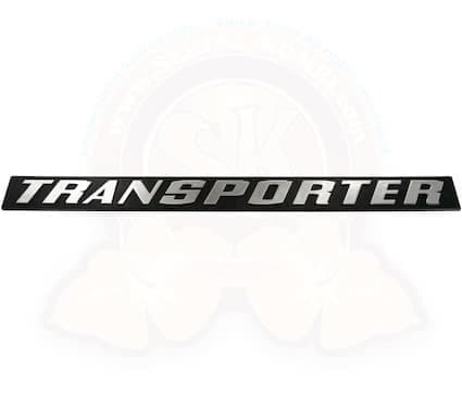 "Transporter" badge for the rear hatch of a Vanagon. Replaces "Vanagon" badge on the rear hatch.